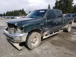 Salvage trucks for sale at Graham, WA auction: 2003 Ford F350 SRW Super Duty