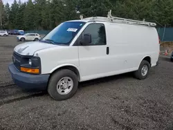 Salvage trucks for sale at Graham, WA auction: 2011 Chevrolet Express G2500