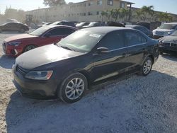 Salvage cars for sale at Opa Locka, FL auction: 2013 Volkswagen Jetta SE