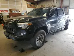 Salvage cars for sale from Copart Bakersfield, CA: 2016 Toyota Tacoma Double Cab