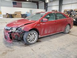 Salvage cars for sale at auction: 2012 Toyota Camry Hybrid