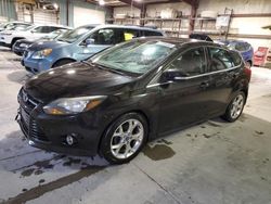 Salvage cars for sale at Eldridge, IA auction: 2012 Ford Focus Titanium