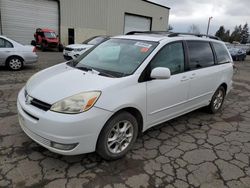 Salvage cars for sale at Woodburn, OR auction: 2005 Toyota Sienna XLE