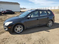 Salvage cars for sale from Copart Portland, MI: 2010 Hyundai Elantra Touring GLS