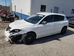 Salvage cars for sale at Farr West, UT auction: 2004 Mazda 3 Hatchback