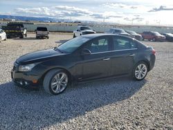 Salvage cars for sale from Copart Casper, WY: 2014 Chevrolet Cruze LTZ