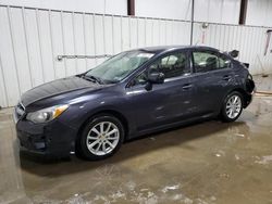 Salvage cars for sale at West Mifflin, PA auction: 2014 Subaru Impreza Premium