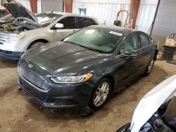 Salvage cars for sale from Copart Lansing, MI: 2015 Ford Fusion SE