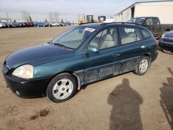 Salvage cars for sale from Copart Rocky View County, AB: 2005 KIA Rio Cinco