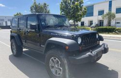 Salvage cars for sale from Copart San Diego, CA: 2013 Jeep Wrangler Unlimited Rubicon