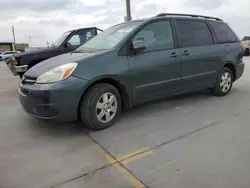 Flood-damaged cars for sale at auction: 2004 Toyota Sienna XLE