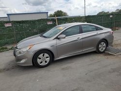 Vehiculos salvage en venta de Copart Orlando, FL: 2012 Hyundai Sonata Hybrid