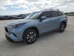 Salvage cars for sale from Copart West Palm Beach, FL: 2023 Toyota Highlander Hybrid XLE