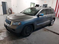 Salvage cars for sale from Copart Northfield, OH: 2011 Jeep Grand Cherokee Overland