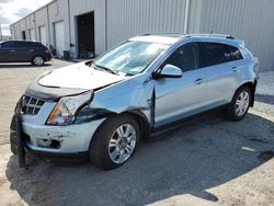 Salvage cars for sale from Copart Jacksonville, FL: 2011 Cadillac SRX Luxury Collection