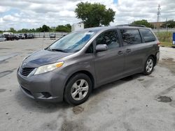 Salvage cars for sale from Copart Orlando, FL: 2013 Toyota Sienna LE