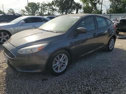 Salvage cars for sale from Copart Riverview, FL: 2018 Ford Focus SE