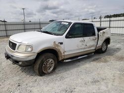 Salvage trucks for sale at Lumberton, NC auction: 2001 Ford F150 Supercrew