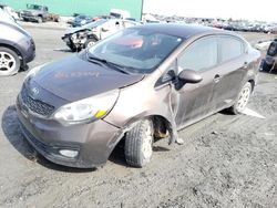 Salvage cars for sale from Copart Montreal Est, QC: 2013 KIA Rio LX