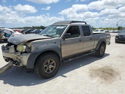Salvage cars for sale from Copart West Palm Beach, FL: 2003 Nissan Frontier Crew Cab XE