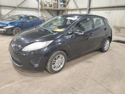 Salvage cars for sale from Copart Montreal Est, QC: 2011 Ford Fiesta SE