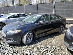 Salvage cars for sale at Waldorf, MD auction: 2015 Ford Fusion Titanium HEV