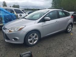 Salvage cars for sale from Copart Arlington, WA: 2013 Ford Focus SE