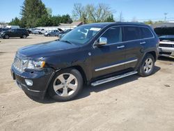 Salvage SUVs for sale at auction: 2013 Jeep Grand Cherokee Overland