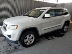 Salvage cars for sale from Copart Orlando, FL: 2011 Jeep Grand Cherokee Laredo