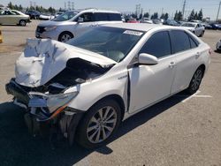 Salvage cars for sale from Copart Rancho Cucamonga, CA: 2015 Toyota Camry Hybrid