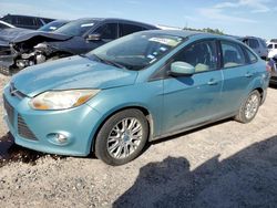 Salvage cars for sale at Houston, TX auction: 2012 Ford Focus SE