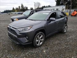Salvage cars for sale from Copart Graham, WA: 2021 Toyota Rav4 XLE Premium
