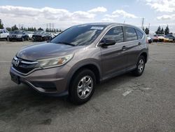 Salvage cars for sale from Copart Rancho Cucamonga, CA: 2015 Honda CR-V LX