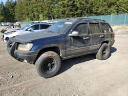 Salvage cars for sale from Copart Graham, WA: 2000 Jeep Grand Cherokee Laredo