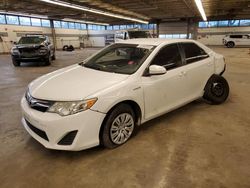 Salvage cars for sale at Wheeling, IL auction: 2012 Toyota Camry Hybrid