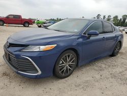 Carros dañados por inundaciones a la venta en subasta: 2024 Toyota Camry XLE