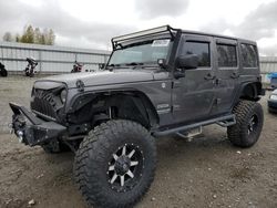 Salvage cars for sale at Arlington, WA auction: 2014 Jeep Wrangler Unlimited Sport