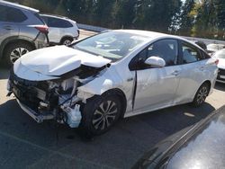 Salvage cars for sale from Copart Arlington, WA: 2022 Toyota Prius Prime LE