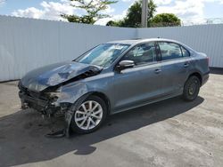 Salvage cars for sale from Copart Miami, FL: 2012 Volkswagen Jetta SE