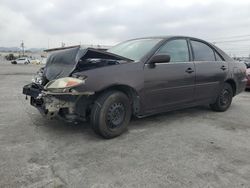 Toyota salvage cars for sale: 2004 Toyota Camry LE