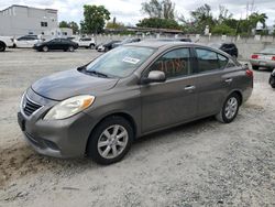Salvage cars for sale from Copart Opa Locka, FL: 2014 Nissan Versa S
