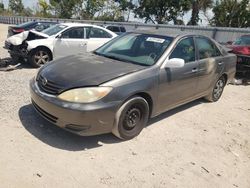 Salvage cars for sale from Copart Riverview, FL: 2003 Toyota Camry LE