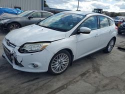 Salvage cars for sale from Copart Orlando, FL: 2012 Ford Focus SEL