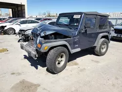 Salvage cars for sale from Copart Kansas City, KS: 2001 Jeep Wrangler / TJ Sport