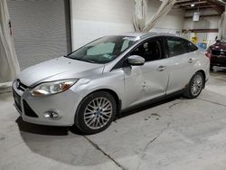 Salvage cars for sale from Copart Leroy, NY: 2012 Ford Focus SEL