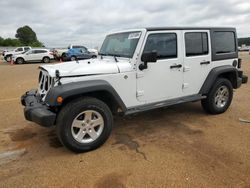 Salvage cars for sale from Copart Longview, TX: 2016 Jeep Wrangler Unlimited Sport