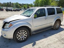 Salvage cars for sale from Copart Fairburn, GA: 2011 Nissan Pathfinder S
