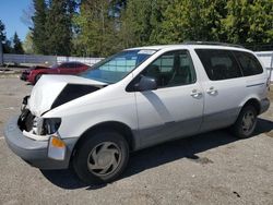 Salvage cars for sale from Copart Arlington, WA: 2000 Toyota Sienna LE