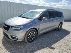 Salvage cars for sale at Arcadia, FL auction: 2021 Chrysler Pacifica Hybrid Touring L