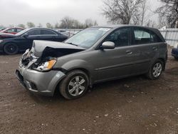 Salvage cars for sale at London, ON auction: 2010 KIA Rio LX